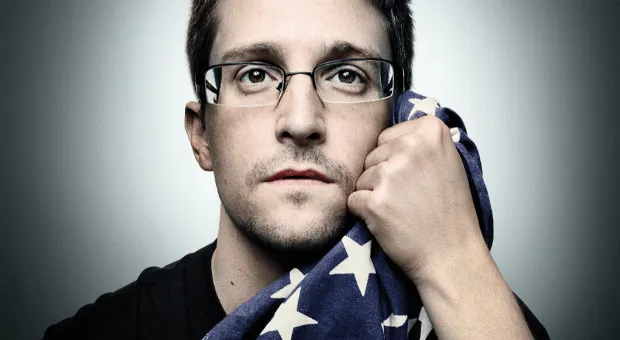 Edward Snowden Holding US Flag